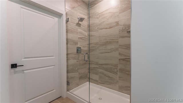 bathroom featuring an enclosed shower