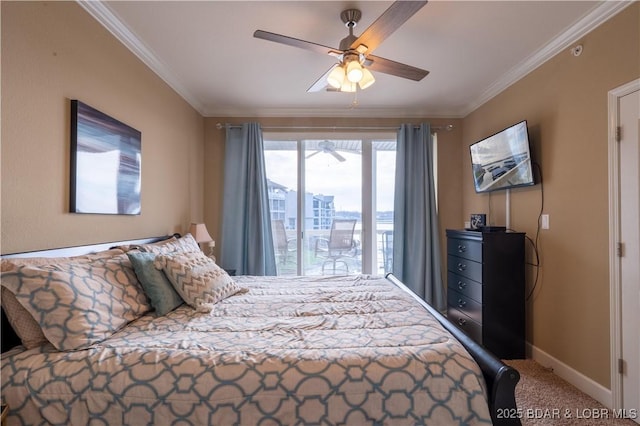 carpeted bedroom featuring ceiling fan and ornamental molding