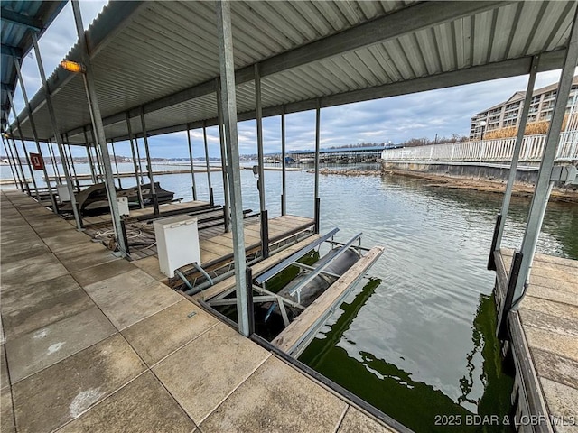 dock area featuring a water view