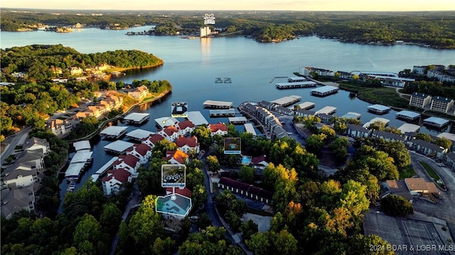 aerial view at dusk with a water view