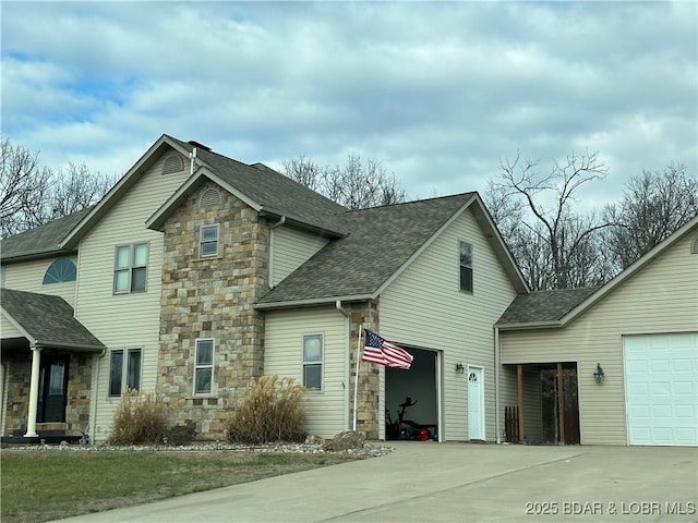 front of property with a garage