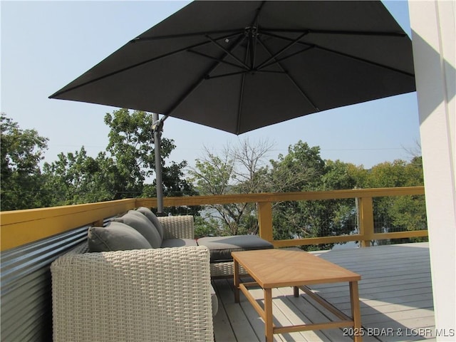 wooden deck featuring an outdoor hangout area