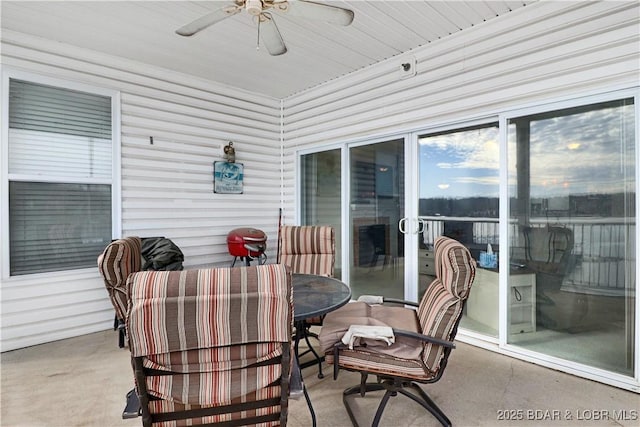 view of patio / terrace featuring outdoor dining area and a ceiling fan