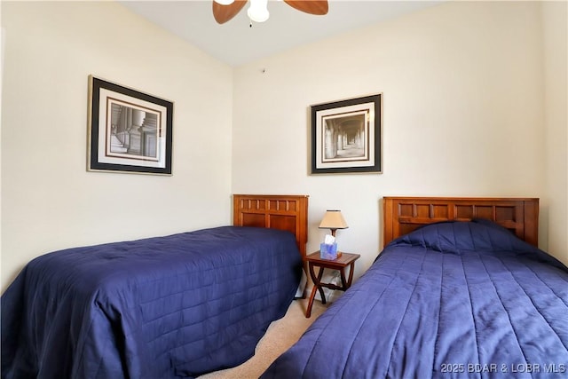 carpeted bedroom featuring a ceiling fan