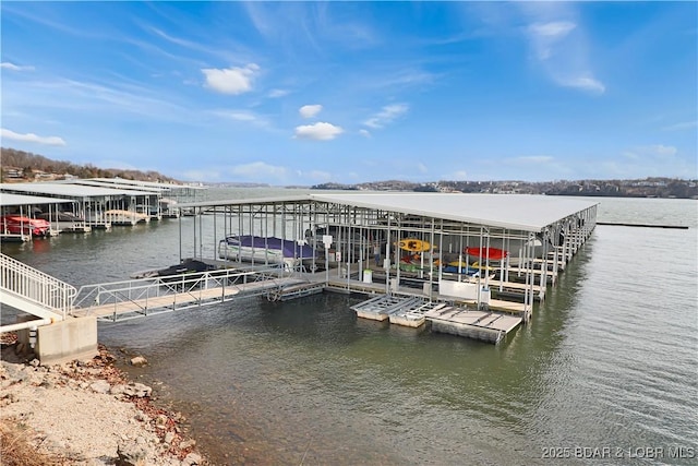 dock area featuring a water view and boat lift