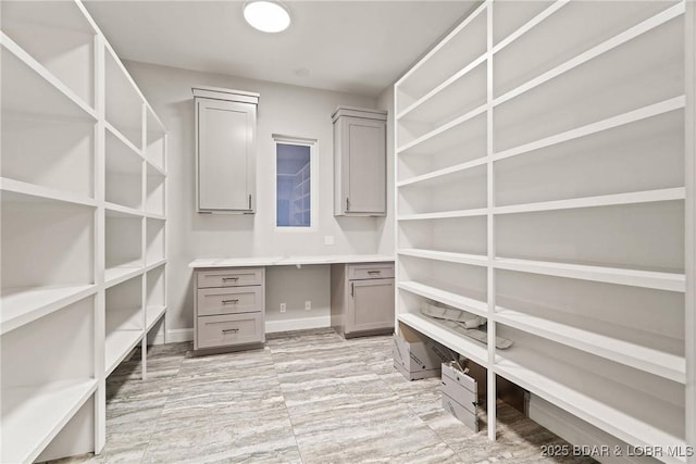 1536 Shootout Dr, Osage Beach, MO 65065 - unfurnished office featuring baseboards and built in study area