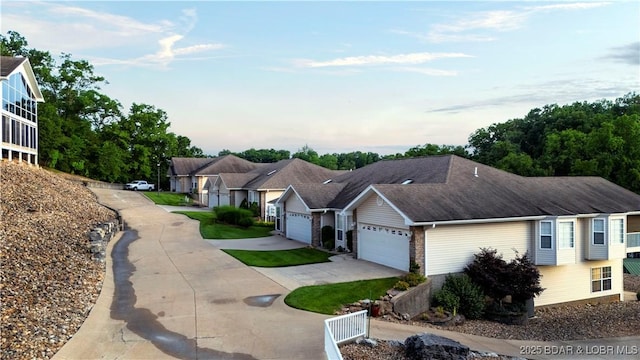 ranch-style house featuring a garage