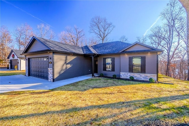 single story home with a front lawn and a garage