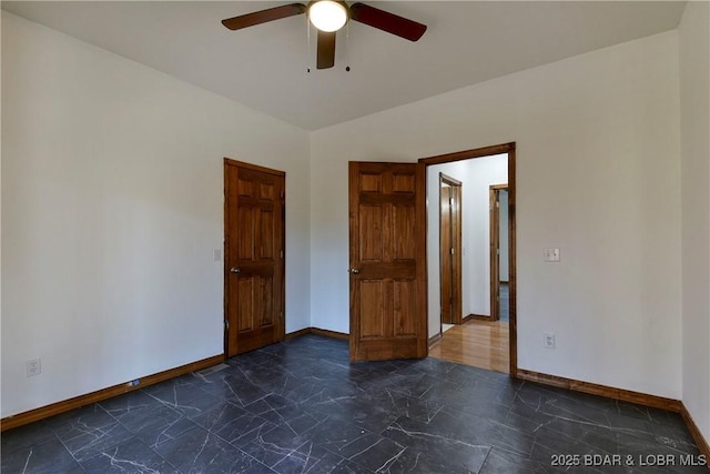 empty room featuring ceiling fan