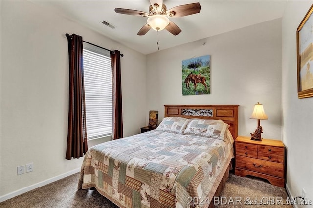 carpeted bedroom with ceiling fan