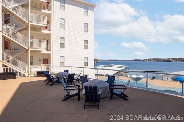 view of patio / terrace with a water view