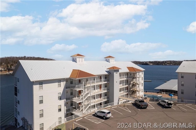 view of building exterior with a water view