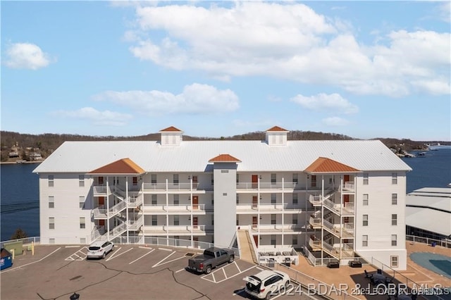 view of property with a water view