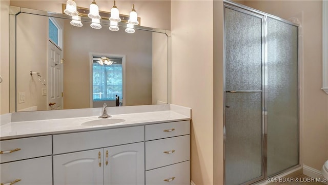 bathroom with vanity and walk in shower