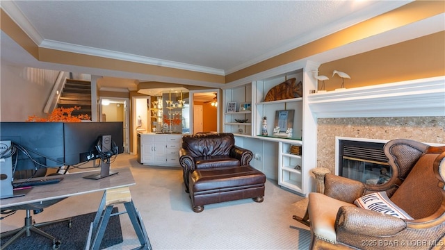 sitting room featuring carpet floors, built in features, and crown molding