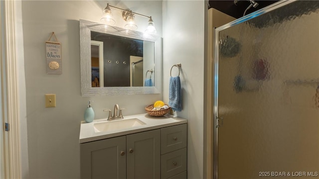 bathroom with vanity and an enclosed shower