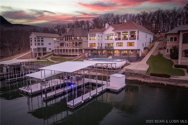 190 Via Cresta Dr, Porto Cima, MO 65079 - dock featuring a water view, an outdoor pool, and a balcony