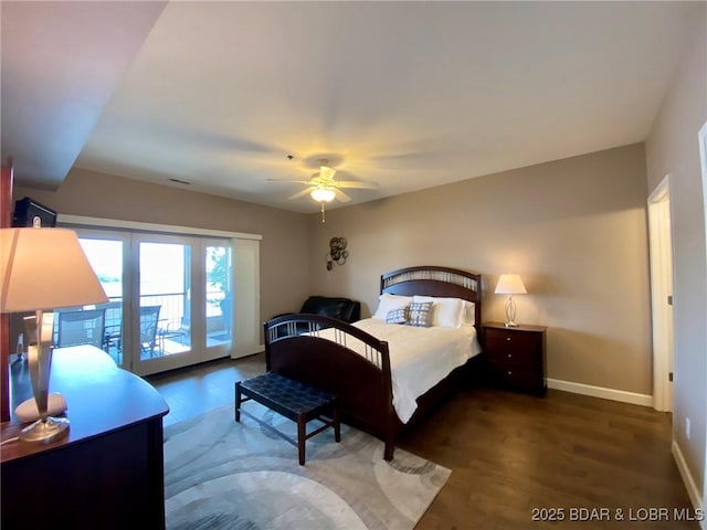bedroom with access to outside, dark hardwood / wood-style floors, and ceiling fan