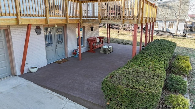 view of patio with a wooden deck