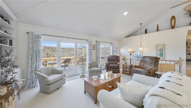 carpeted living room featuring lofted ceiling, wooden ceiling, crown molding, and a healthy amount of sunlight