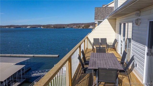 balcony featuring a water view