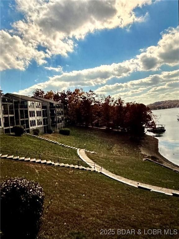 view of yard with a water view