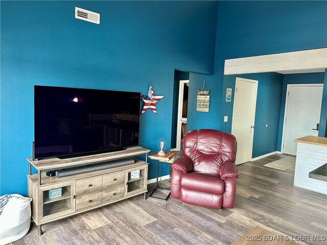 living room with hardwood / wood-style flooring