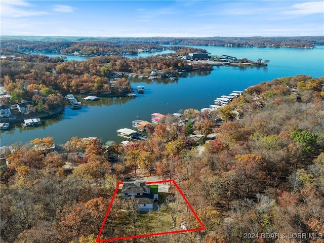 birds eye view of property featuring a water view