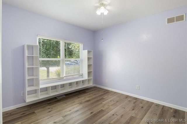 unfurnished room featuring light wood-type flooring