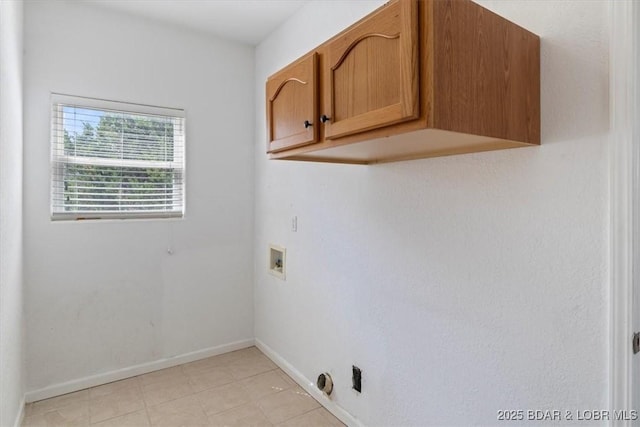 laundry area with cabinets and washer hookup