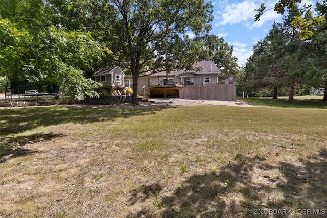 view of yard with a deck