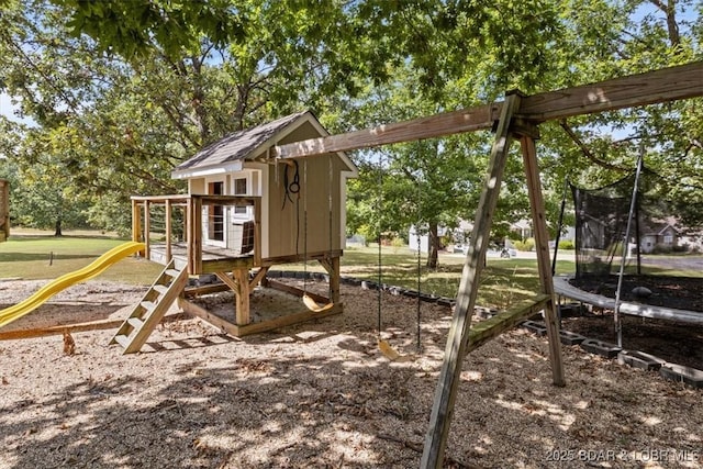 view of jungle gym with a trampoline