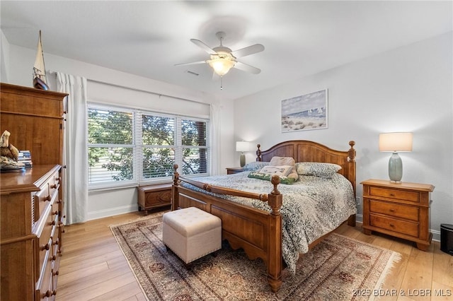 bedroom featuring light wood-type flooring and ceiling fan