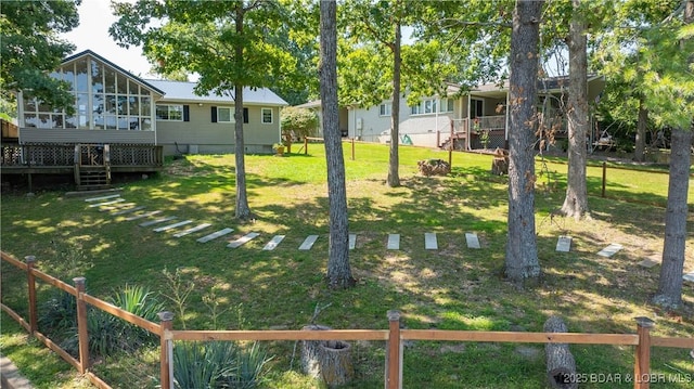 view of yard featuring a wooden deck