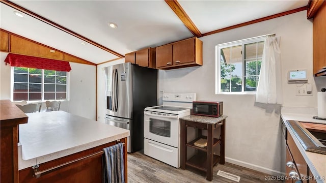 kitchen with stainless steel fridge with ice dispenser, light wood-type flooring, white range with electric cooktop, and lofted ceiling