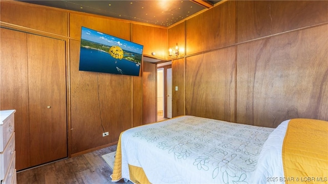 bedroom featuring a closet and hardwood / wood-style flooring