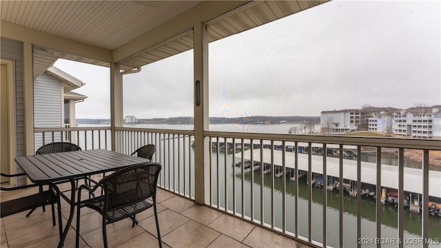 balcony featuring a water view