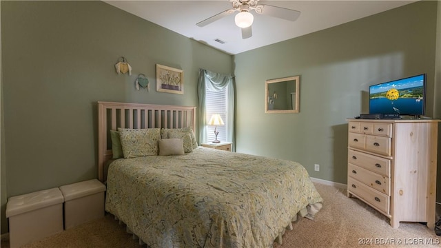 carpeted bedroom featuring ceiling fan