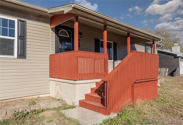 property entrance with a porch