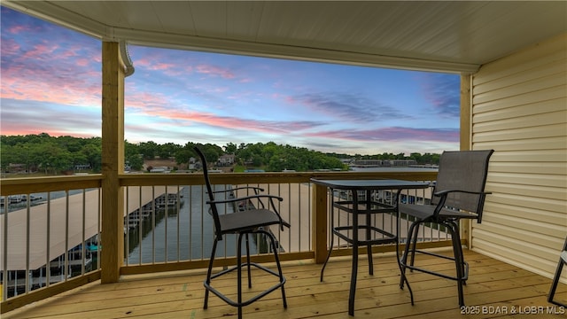 deck at dusk with a water view