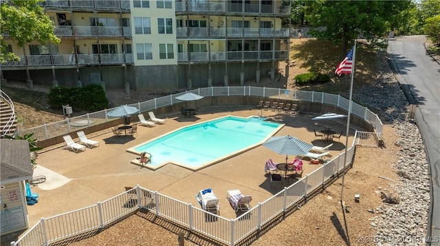 view of swimming pool with a patio