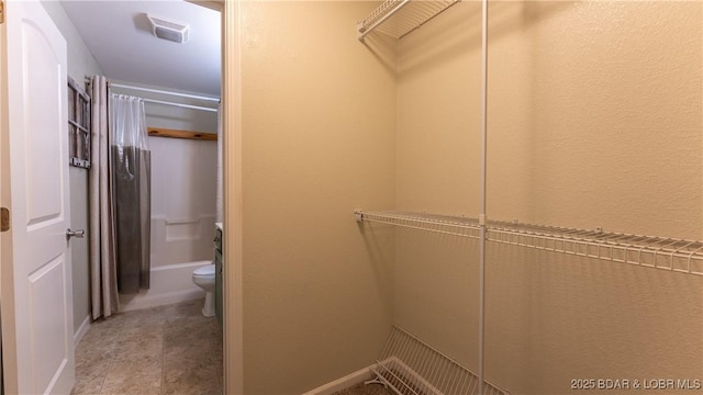 view of walk in closet