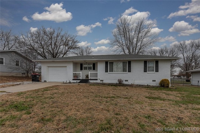 single story home with covered porch, a garage, and a front lawn