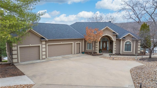 ranch-style home featuring a garage