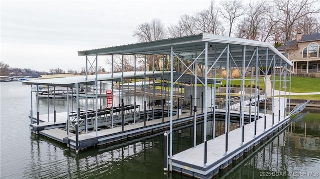 dock area featuring a water view