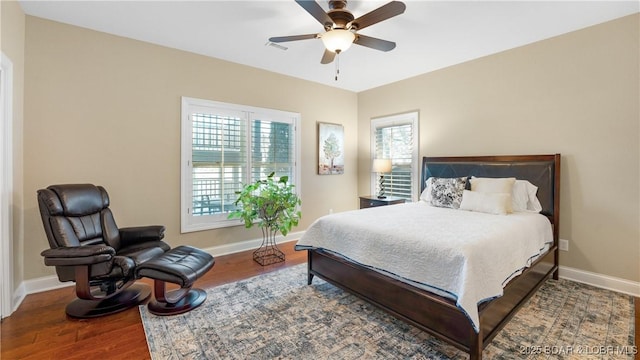 bedroom featuring wood-type flooring and ceiling fan