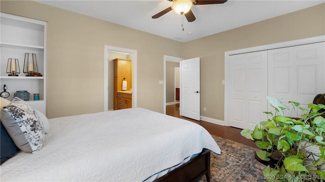 bedroom with dark wood-type flooring, ceiling fan, and a closet