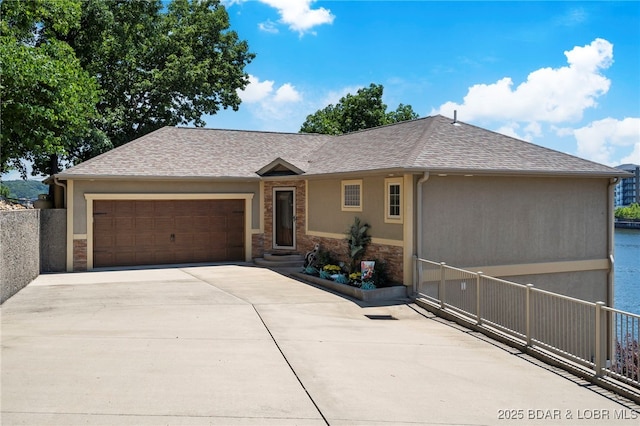 ranch-style house featuring a garage