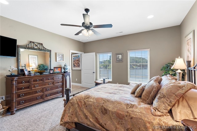 carpeted bedroom with ceiling fan