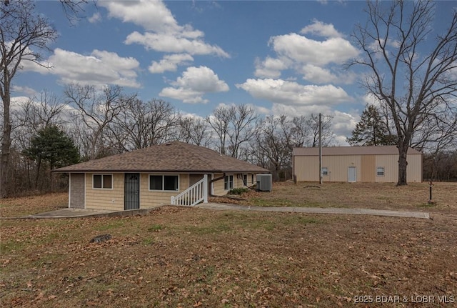 view of front of home featuring central air condition unit